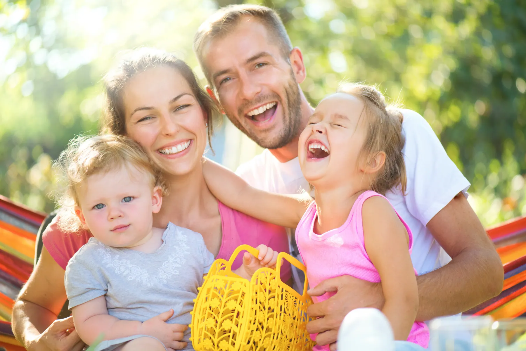 Family of Hacton patients smiling outdoors