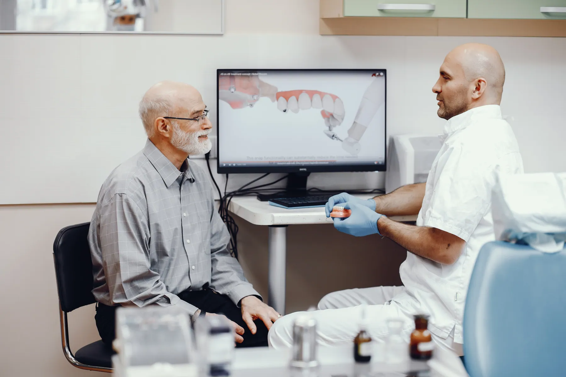 Older Hornchurch patient calmly viewing his treatment plan with a clinician