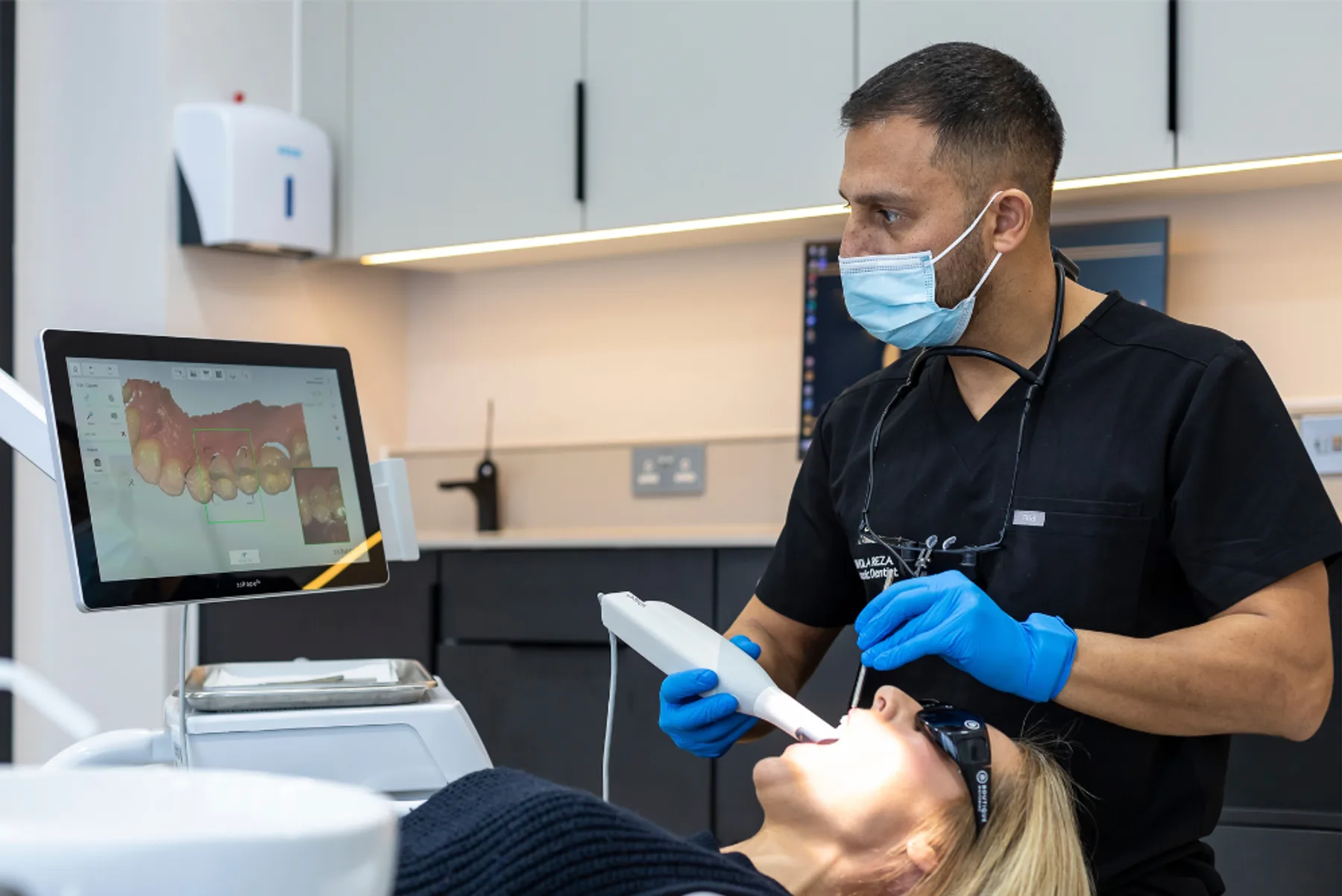 Hacton Dental Care clinician using an intraoral scanner during a digital scan